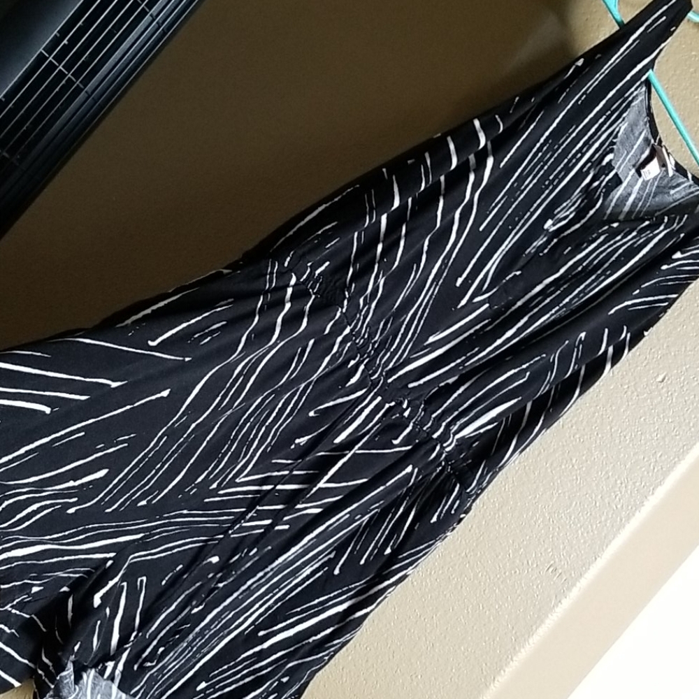 Strip romper with belt to show off waist
